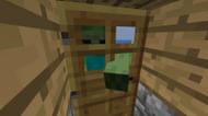 Zombies can break doors (Image via Mojang)